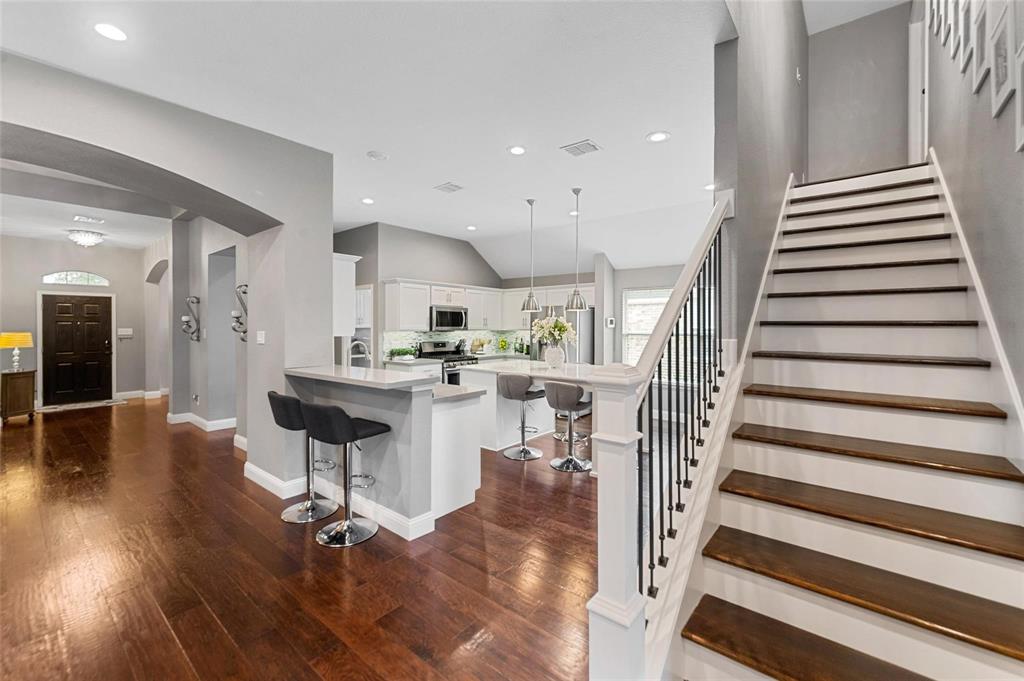 1551 Crystal Pass Allen, TX 75002 - Photo 6 of 27 a view of kitchen with furniture and wooden floor