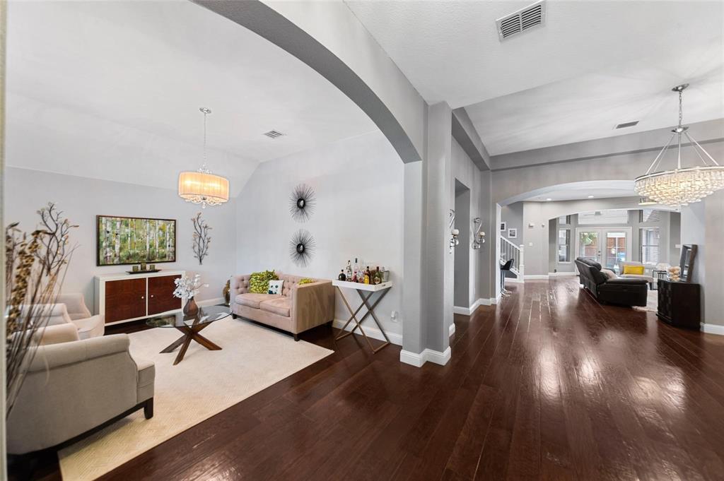 1551 Crystal Pass Allen, TX 75002 - Photo 8 of 27 a living room with furniture and a large window