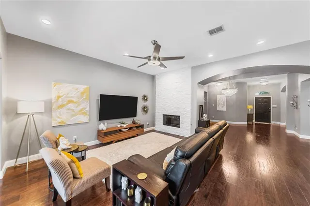 a workspace with furniture and wooden floor