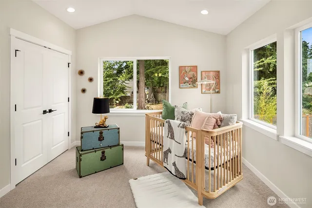 a living room with furniture and windows
