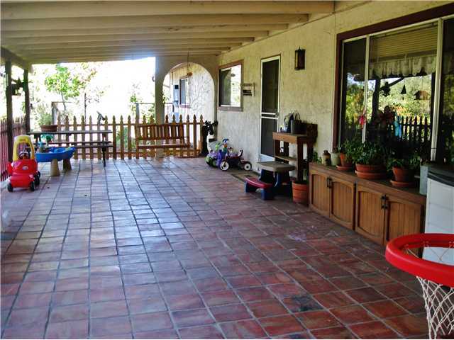 27309 Oakmont Road Valley Center, CA 92082 - Photo 14 of 17 Front covered Patio with tile floor.