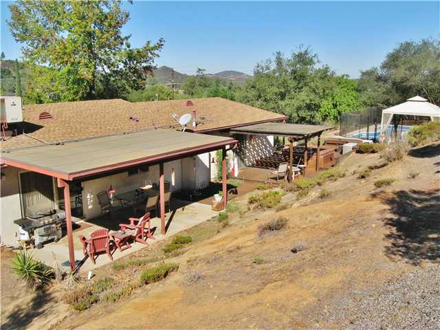 27309 Oakmont Road Valley Center, CA 92082 - Photo 10 of 17 Back of the Home with Pool, Spa and covered Patio.