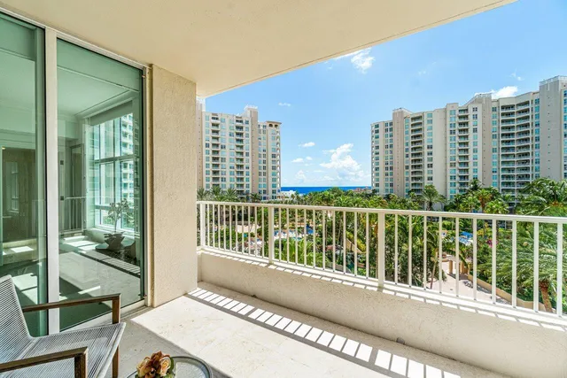 a balcony with a city view