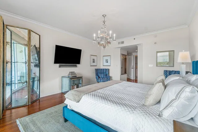 a spacious bathroom with a bathtub sink and mirror