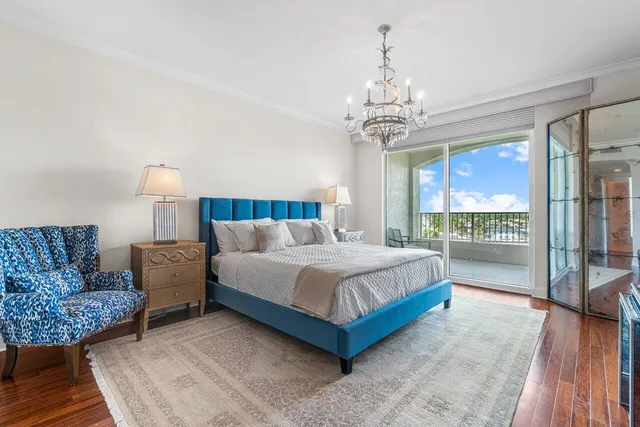 a spacious bedroom with a bed and a couch