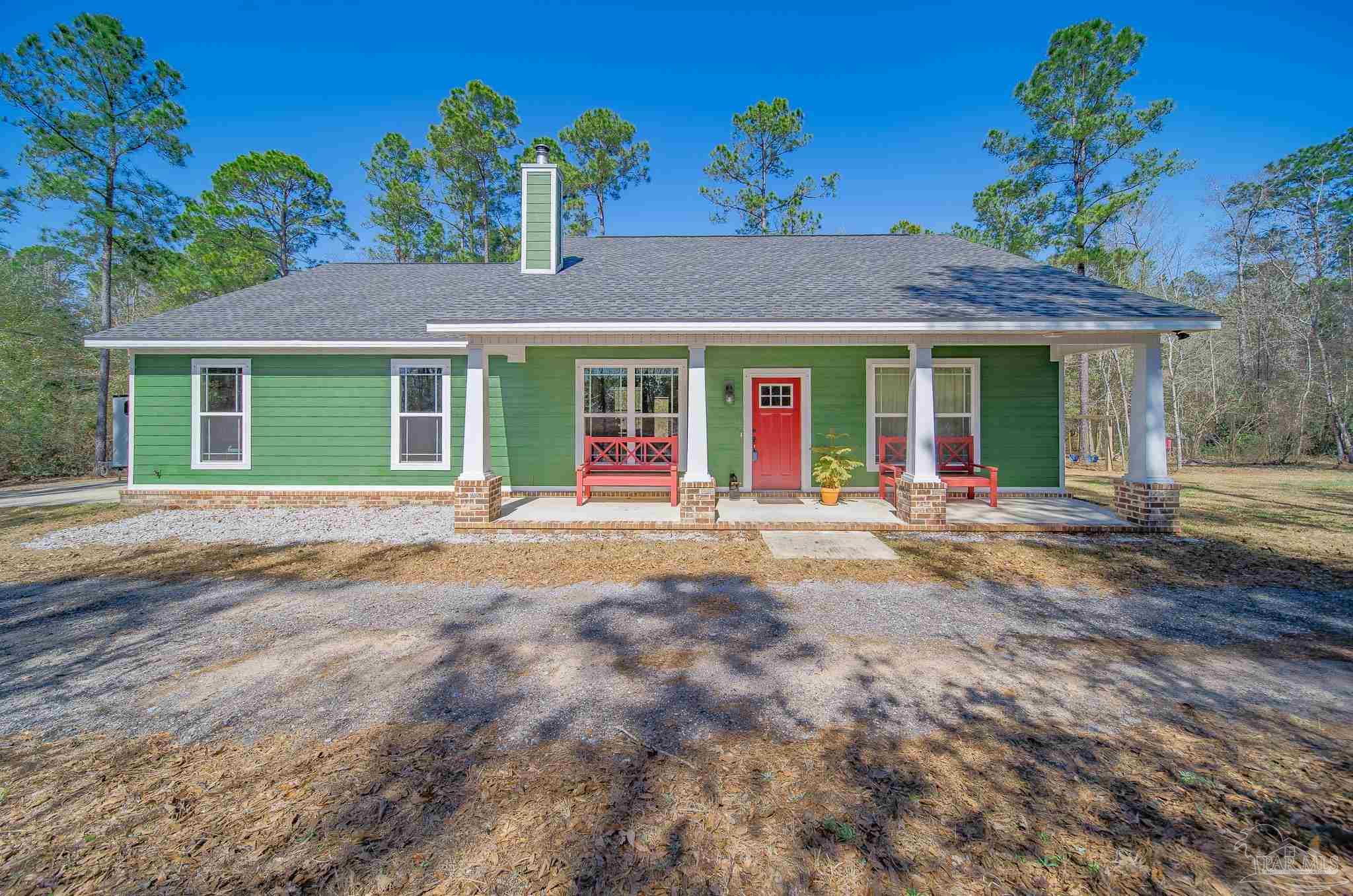 2800 Dunsford Road Jay, FL 32565 - Photo 1 of 42 front view of a house with a yard