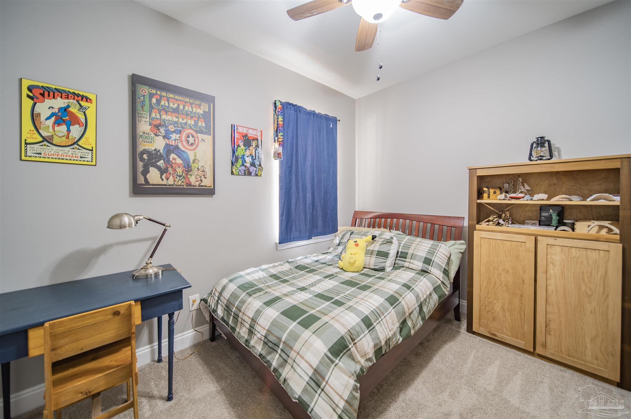 2800 Dunsford Road Jay, FL 32565 - Photo 24 of 42 a bedroom with a bed and a lamp on a dresser