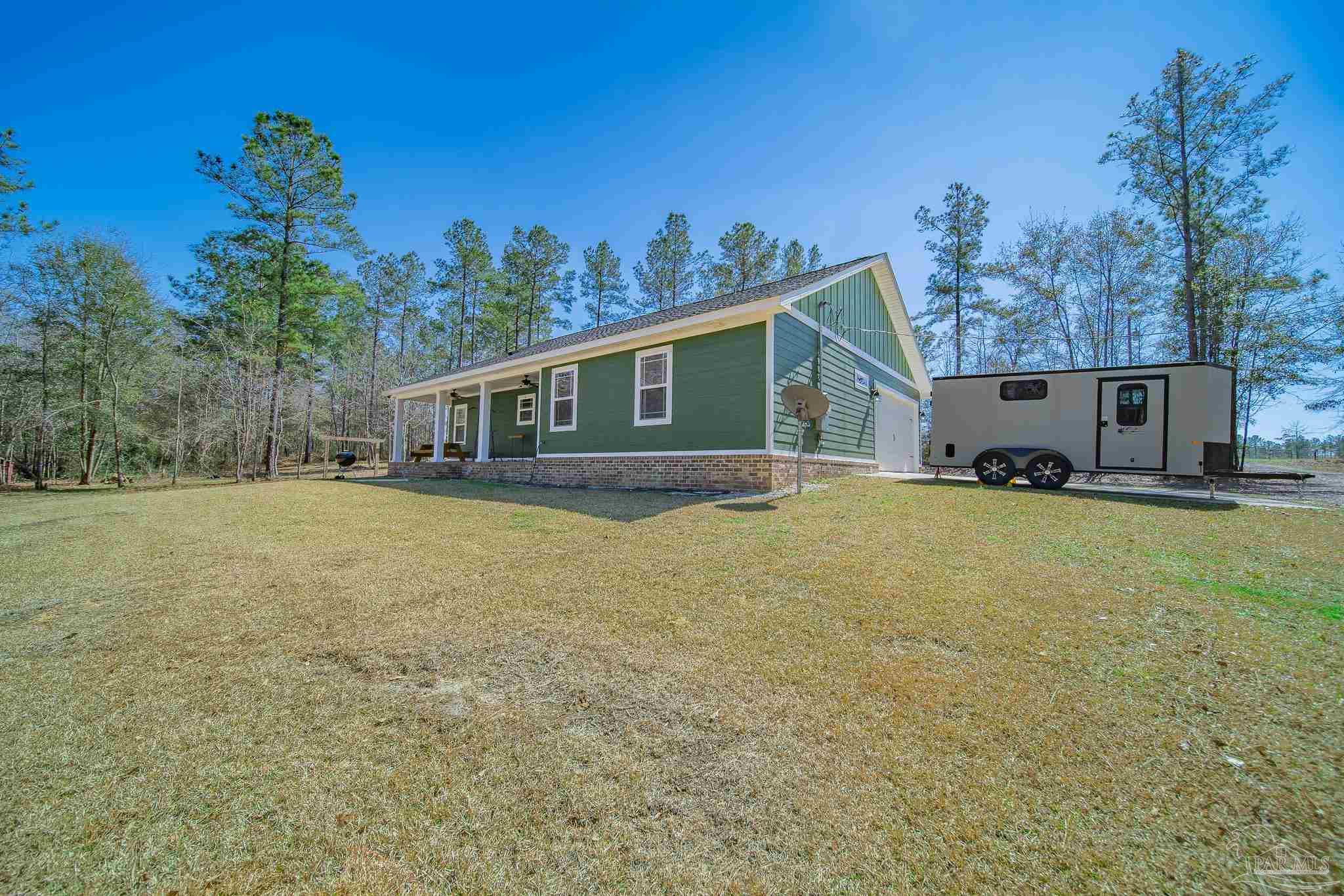 2800 Dunsford Road Jay, FL 32565 - Photo 28 of 42 a house view with a garden space