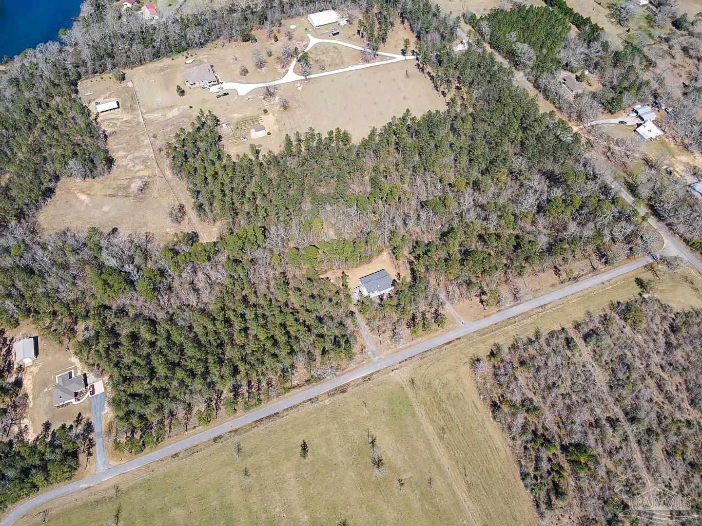 2800 Dunsford Road Jay, FL 32565 - Photo 41 of 42 a view of a small yard with wooden fence