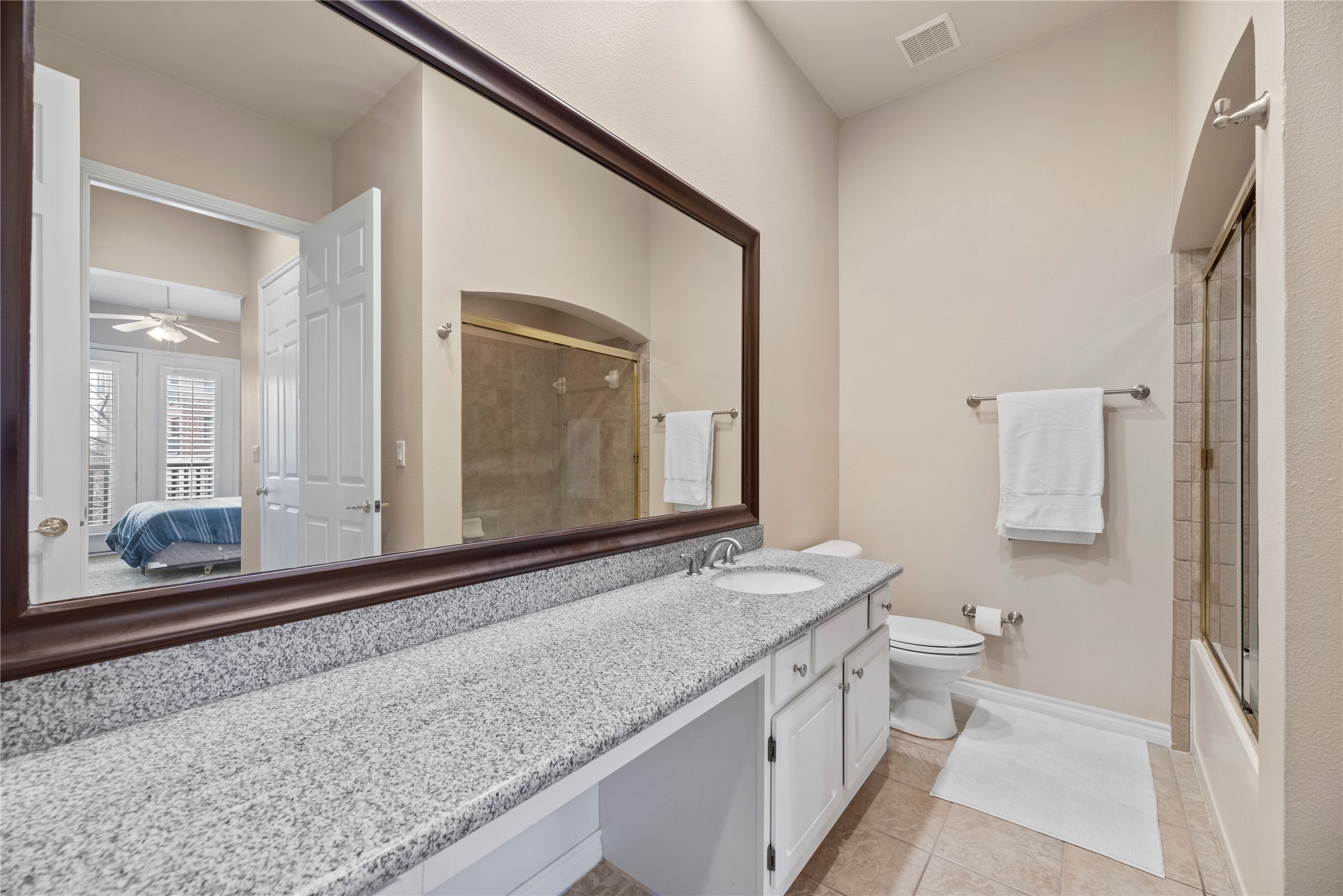 2400 McCue Road, Unit 206 Houston, TX 77056 - Photo 10 of 17 The 2nd bathroom offers a large vanity and access to the 2nd bedroom.