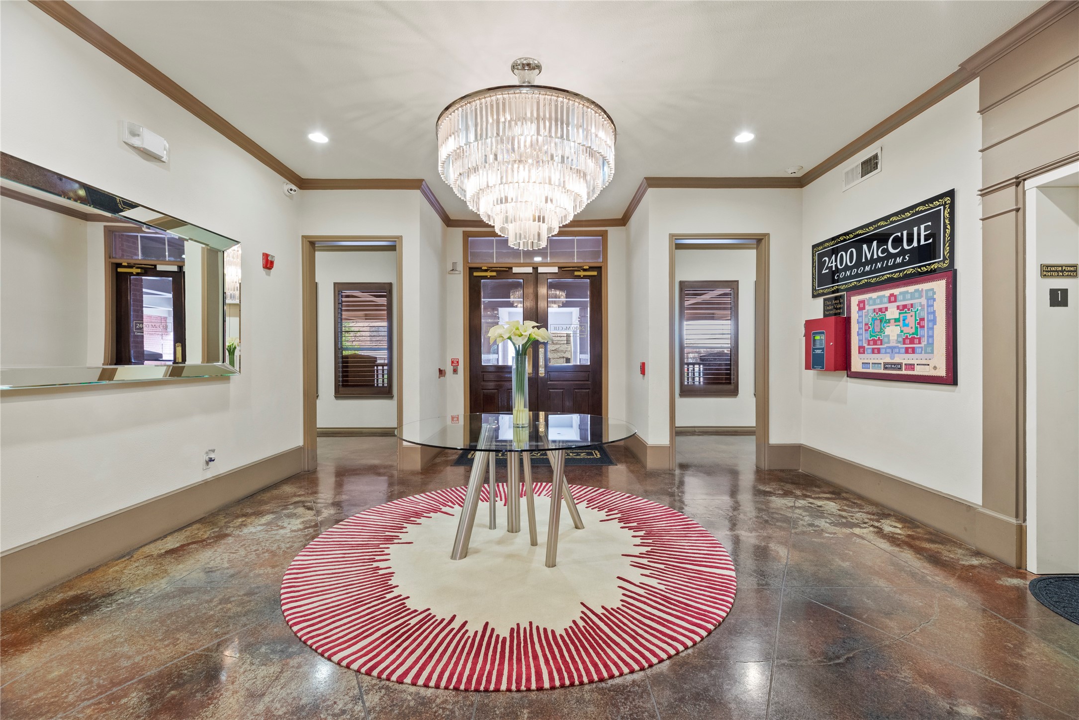 2400 McCue Road, Unit 206 Houston, TX 77056 - Photo 11 of 17 Elevator cluster for guests and residents to take you to your desired floor.