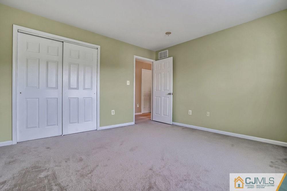 23 Mapleton Road Old Bridge, NJ 08857 - Photo 17 of 24 an empty room with closet area