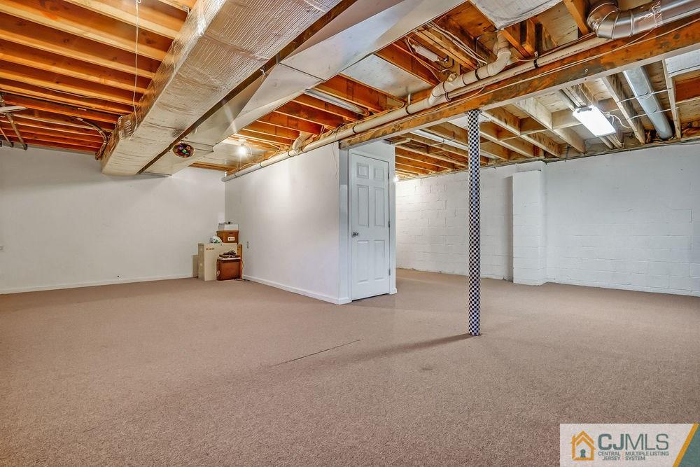 23 Mapleton Road Old Bridge, NJ 08857 - Photo 21 of 24 a view of a room with wooden walls