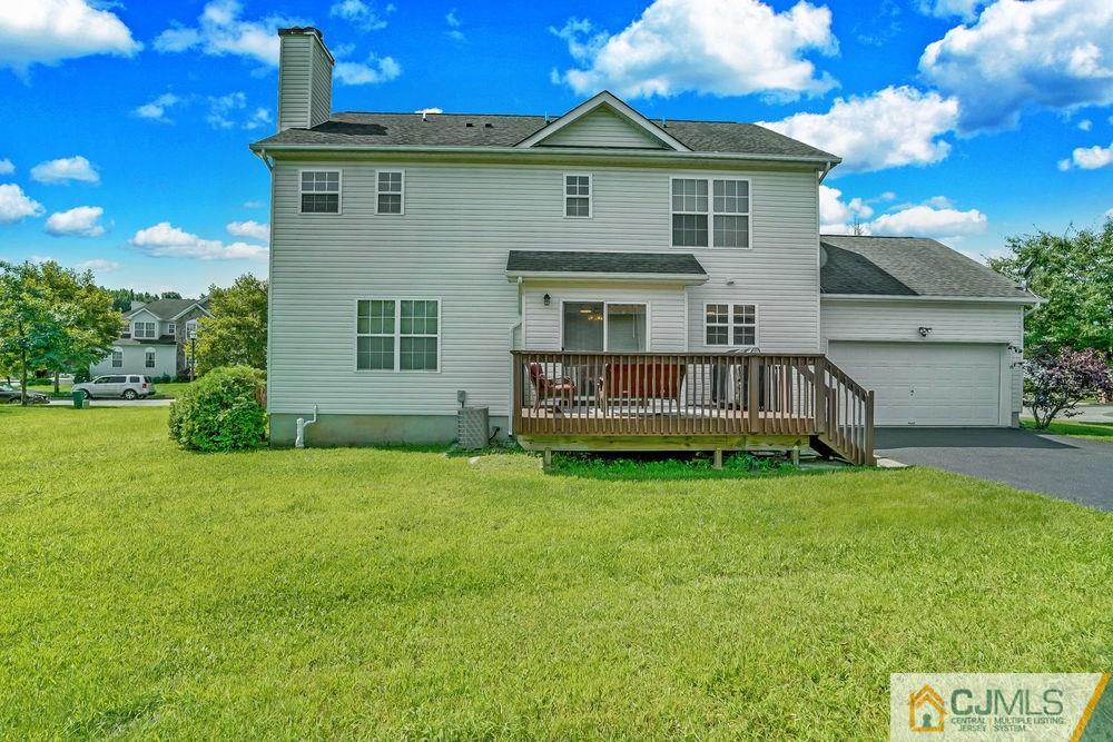 23 Mapleton Road Old Bridge, NJ 08857 - Photo 22 of 24 a view of a house with a yard