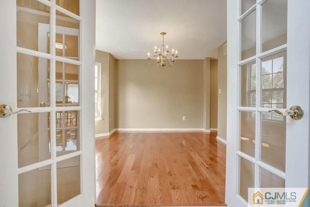 23 Mapleton Road Old Bridge, NJ 08857 - Photo 7 of 24 a view of an empty room with a window