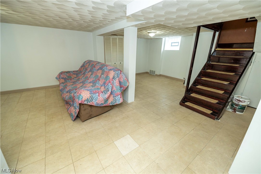 10105 Unity Avenue Cleveland, OH 44111 - Photo 21 of 35 Basement with light tile flooring