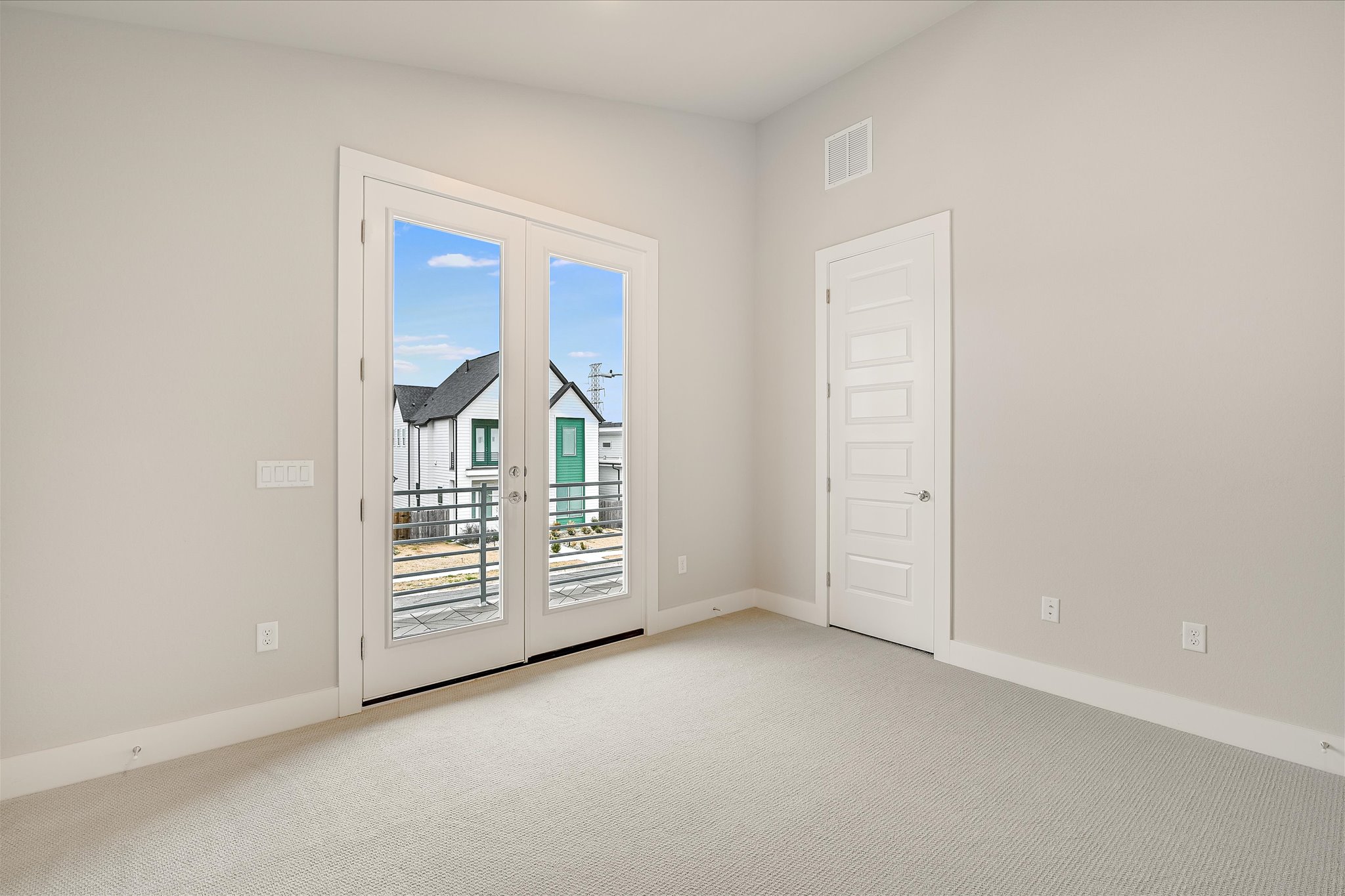 6136 Florencia Lane Austin, TX 78724 - Photo 16 of 40 Large Secondary Bedroom with Walk In Closet and Nice Sized Balcony