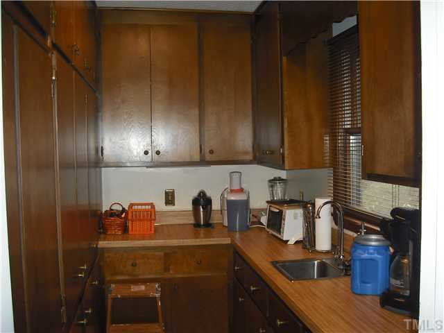 3316 Manor Ridge Drive Raleigh, NC 27603 - Photo 6 of 15 The walk-in pantry has an abundance of cabinets, counterspace as well as a sink. This is but one example of the tremendous storage this home has to offer! Pantry