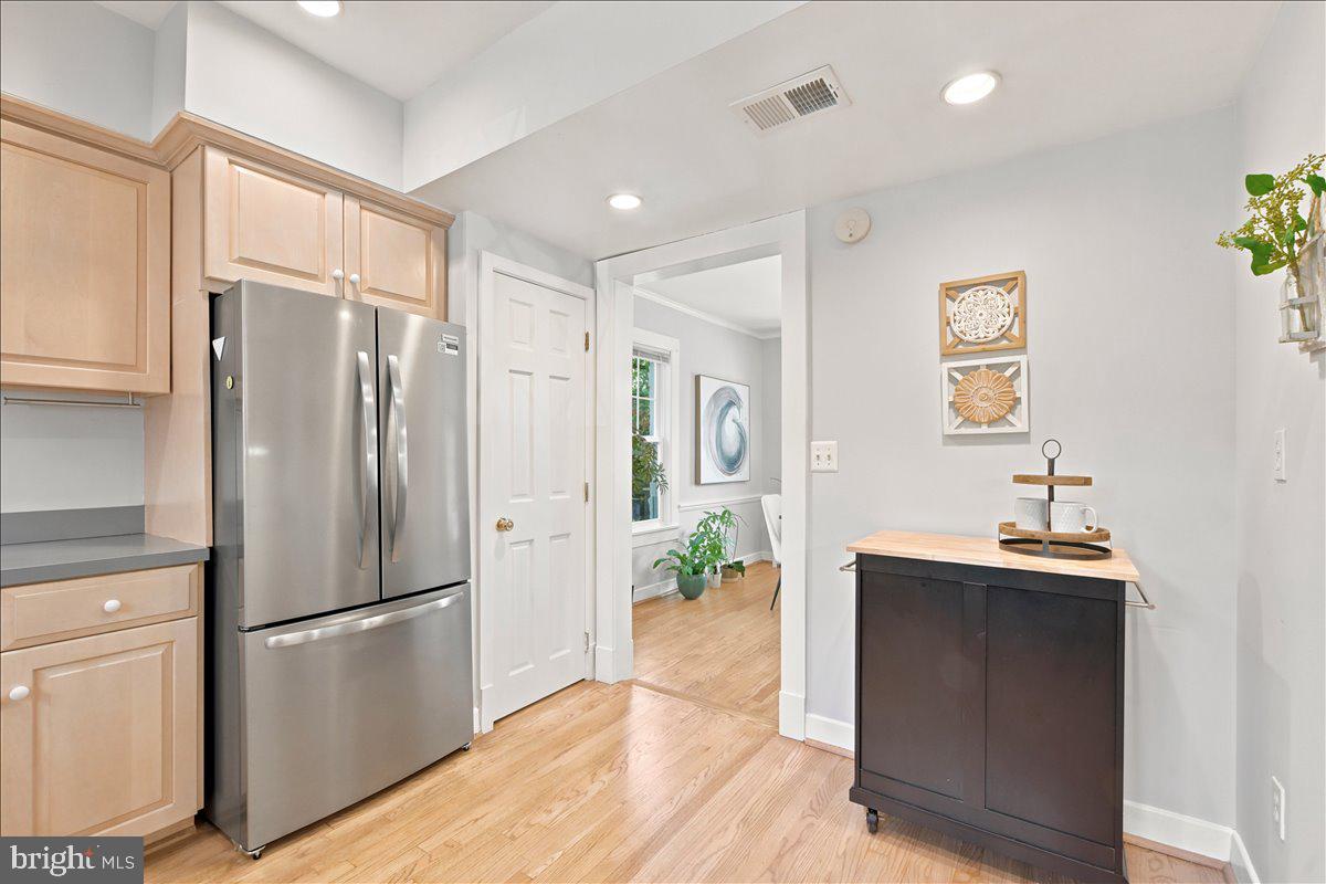 2800 South Arlington Ridge Road Arlington, VA 22206 - Photo 17 of 54 a kitchen with stainless steel appliances a refrigerator and a sink