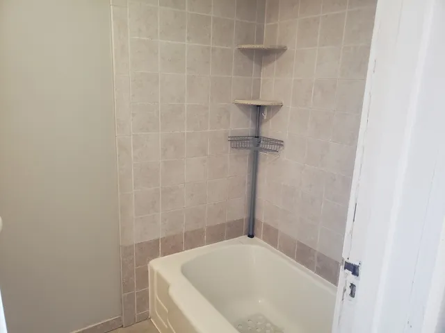 a bathroom with a bathtub