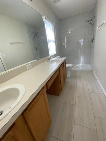 a bathroom with a bathtub and a sink