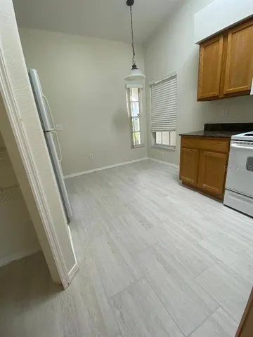 a view of a kitchen with a sink and dishwasher