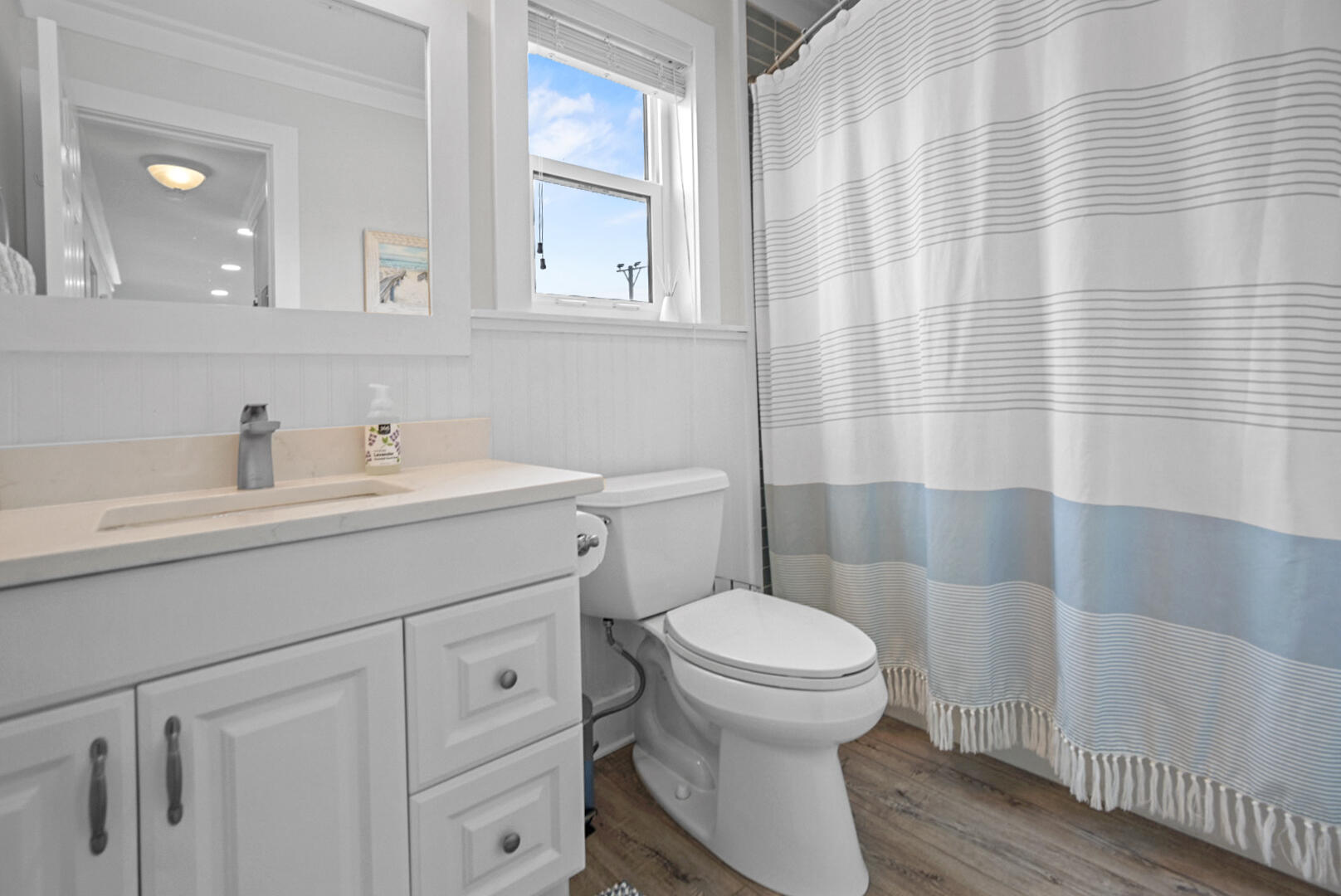 11 Beachside Drive, Unit 123 Santa Rosa Beach, FL 32459 - Photo 14 of 22 a bathroom with a sink toilet and shower