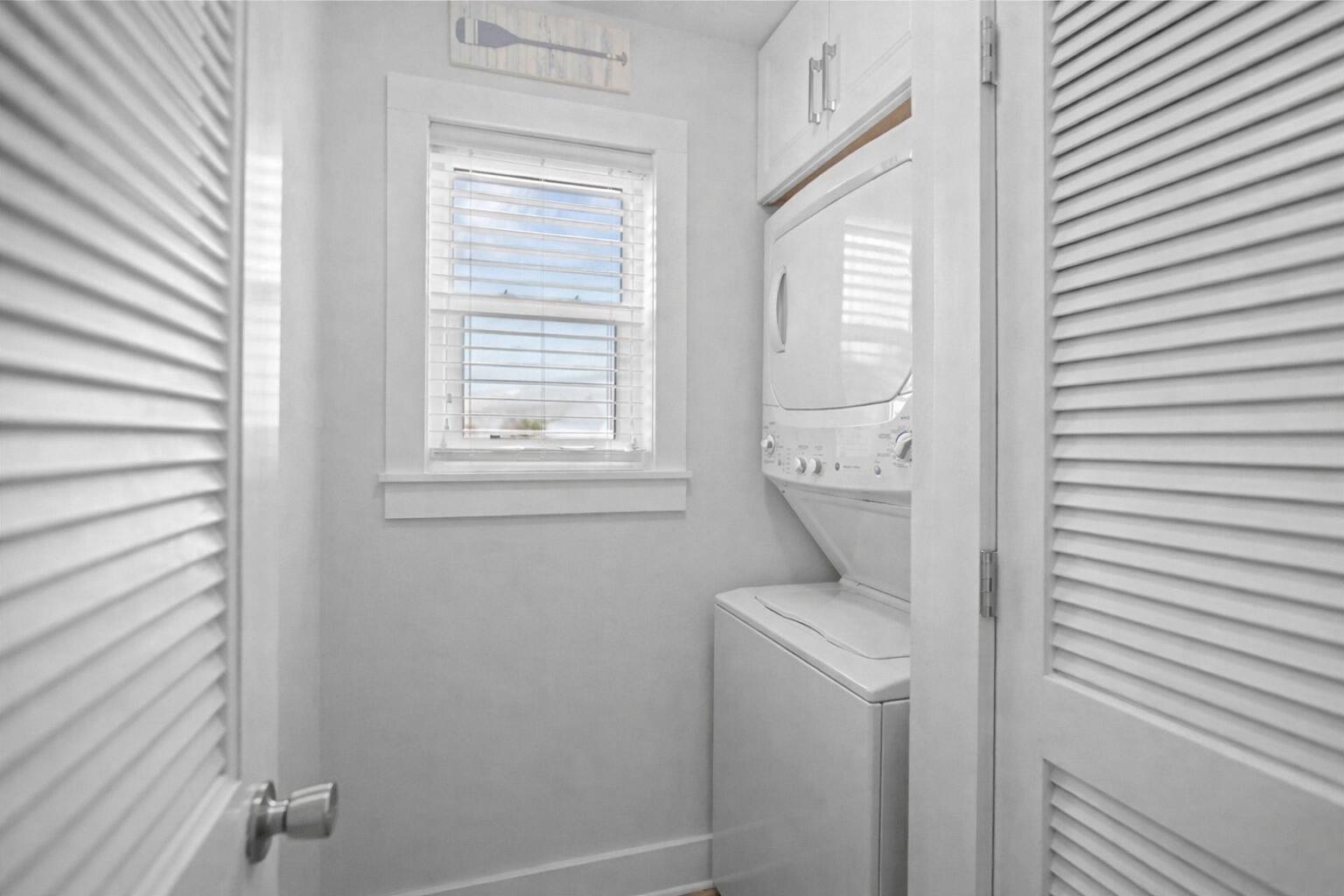 11 Beachside Drive, Unit 123 Santa Rosa Beach, FL 32459 - Photo 17 of 22 a room with a washer and dryer