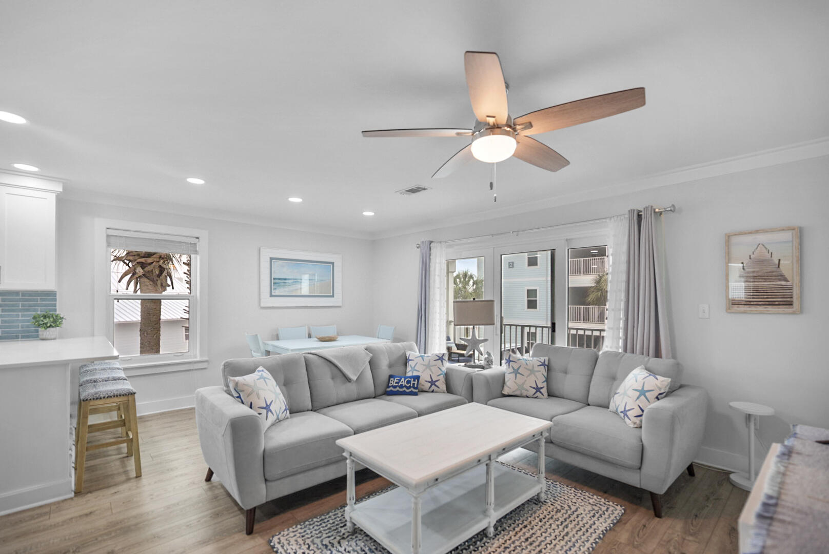 11 Beachside Drive, Unit 123 Santa Rosa Beach, FL 32459 - Photo 4 of 22 a living room with furniture and a large window
