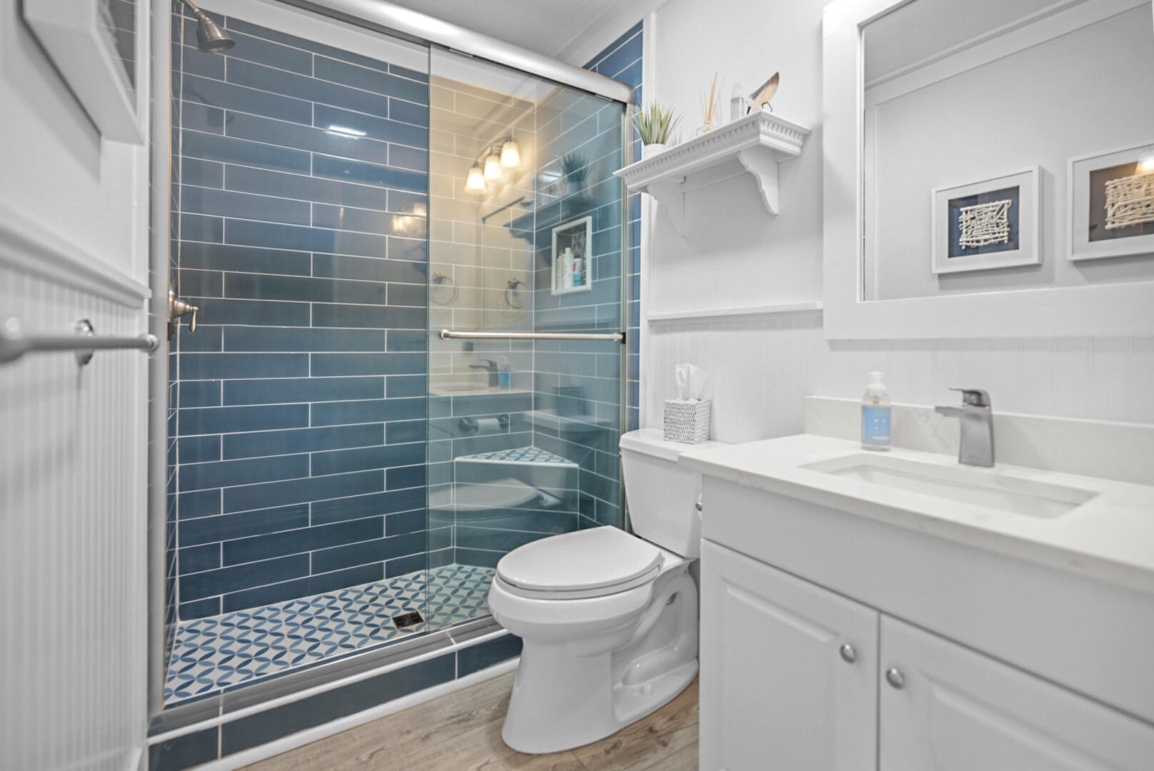 11 Beachside Drive, Unit 123 Santa Rosa Beach, FL 32459 - Photo 10 of 22 a bathroom with a sink toilet and shower