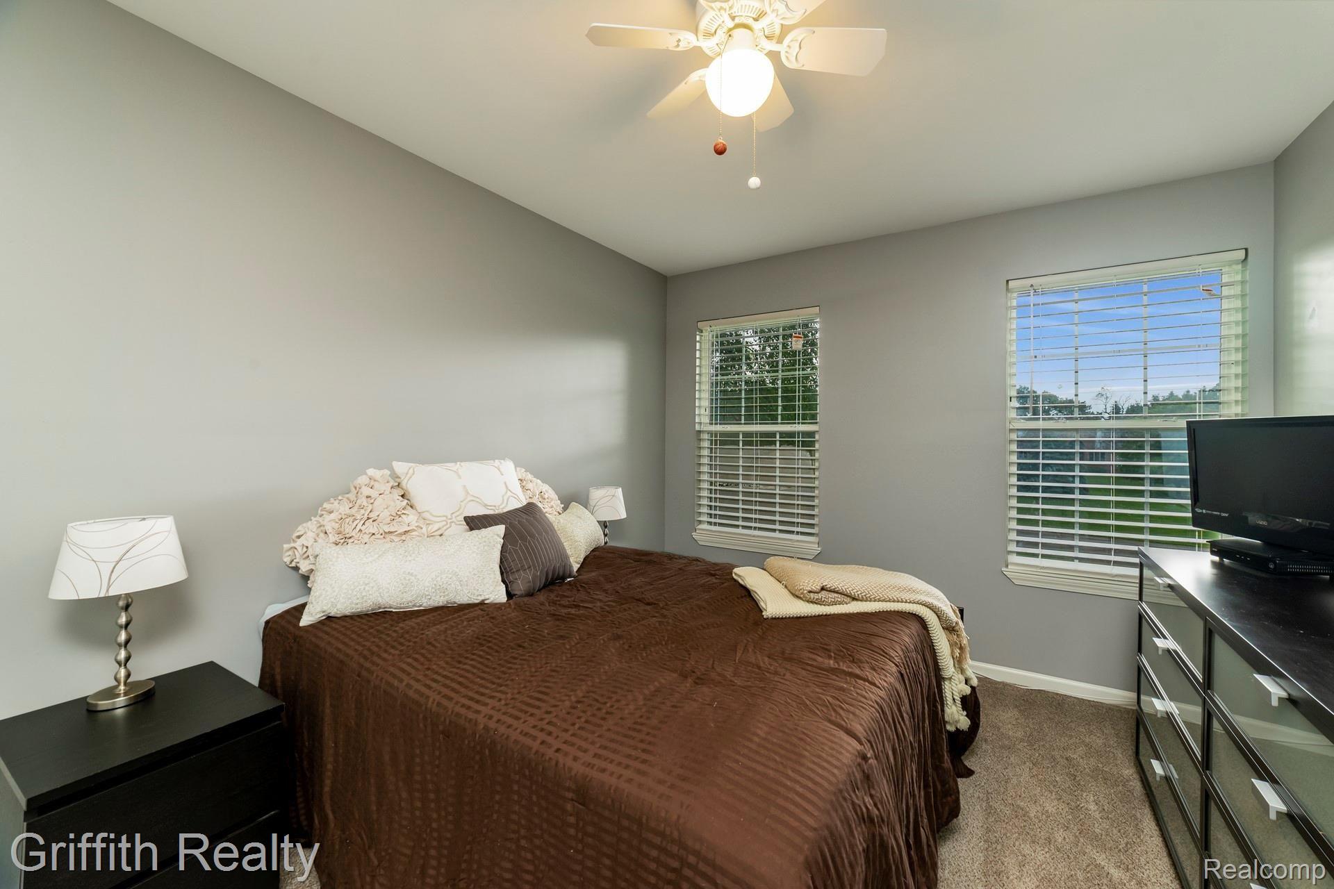 1899 Clover Ridge Drive Howell, MI 48843 - Photo 19 of 28 018-photo-bedroom-7163814.jpg