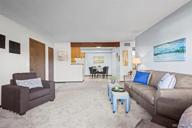 a living room with furniture and a couch