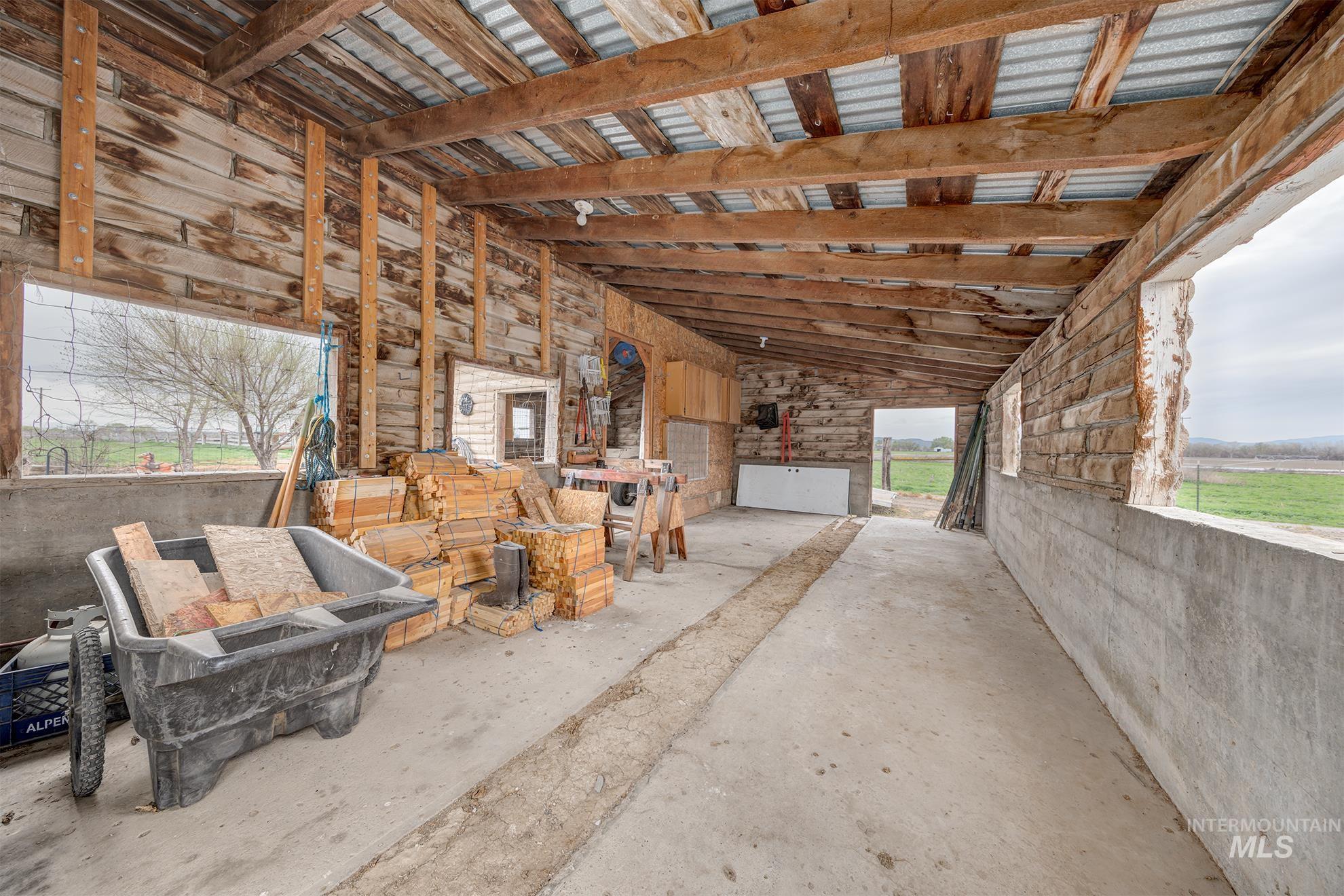 1363 Ross Road Weiser, ID 83672 - Photo 30 of 47 Misc room with vaulted ceiling and concrete floors