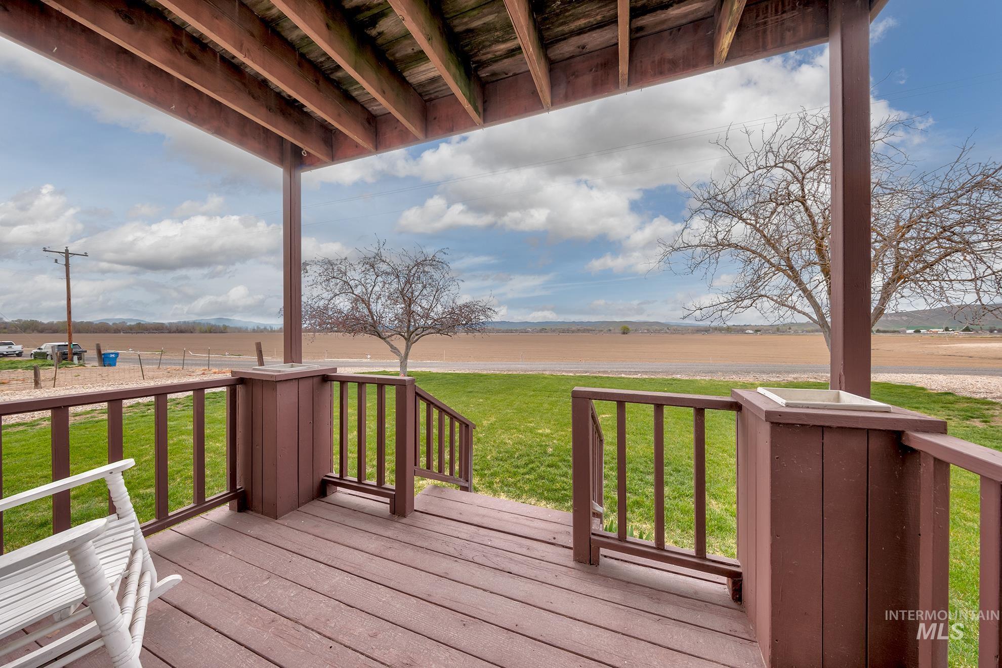 1363 Ross Road Weiser, ID 83672 - Photo 40 of 47 Deck featuring a lawn