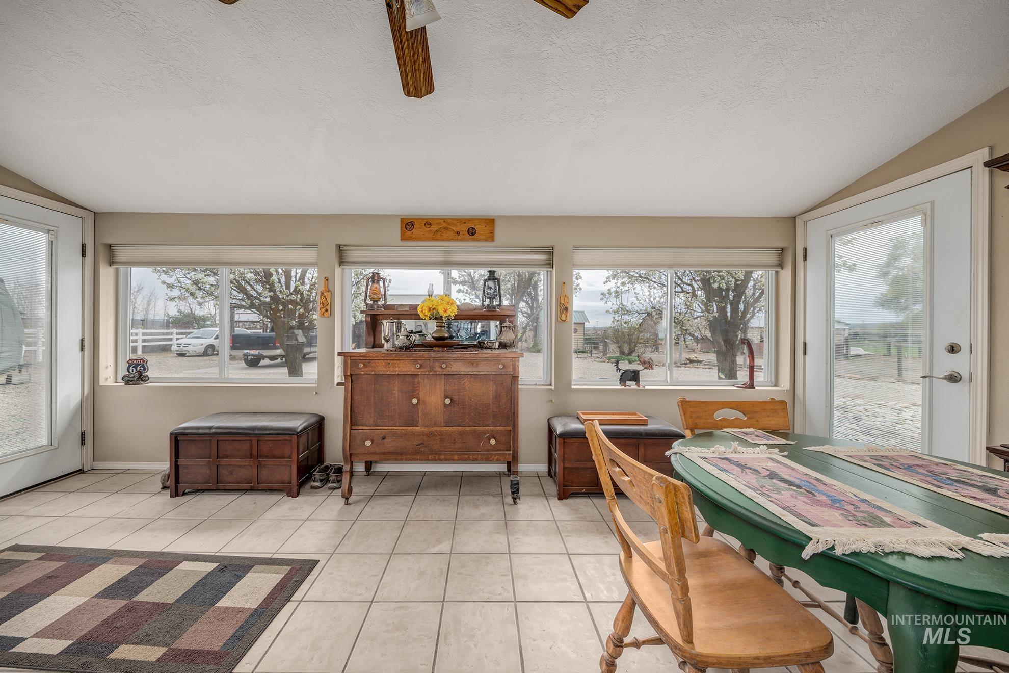 1363 Ross Road Weiser, ID 83672 - Photo 10 of 47 Sunroom featuring lofted ceiling and healthy amount of natural light