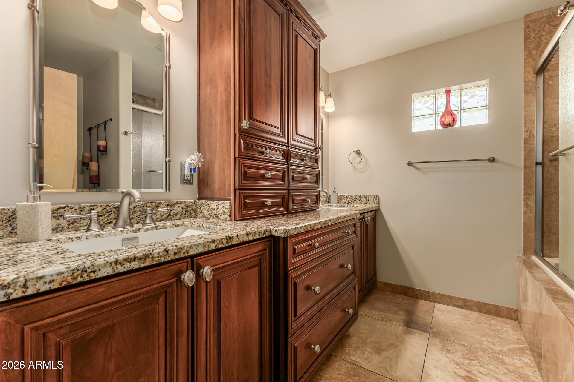 1003 East Watson Drive Tempe, AZ 85283 - Photo 29 of 39 a bathroom with double sink and a mirror