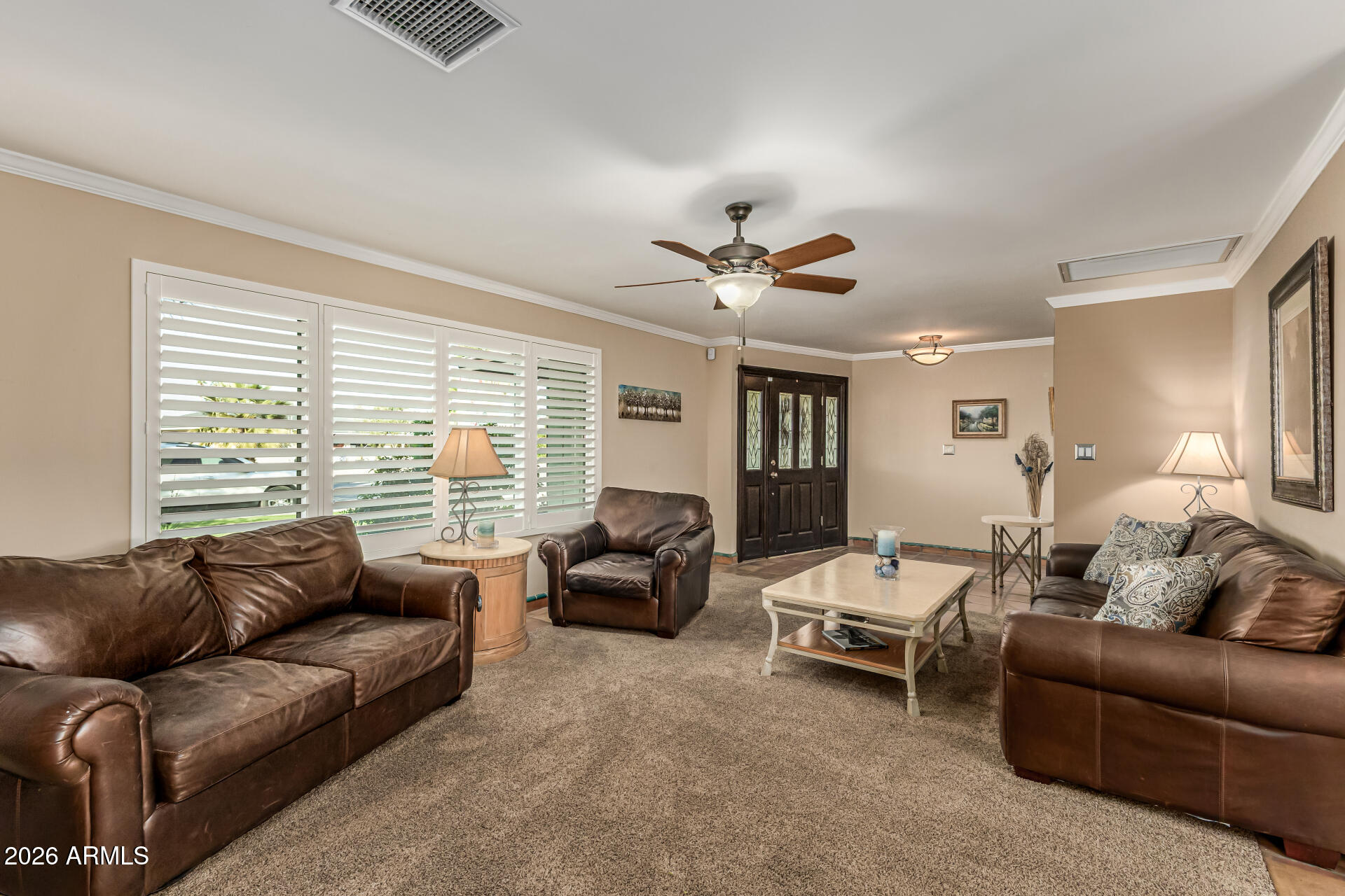 1003 East Watson Drive Tempe, AZ 85283 - Photo 4 of 39 a living room with furniture and a large window