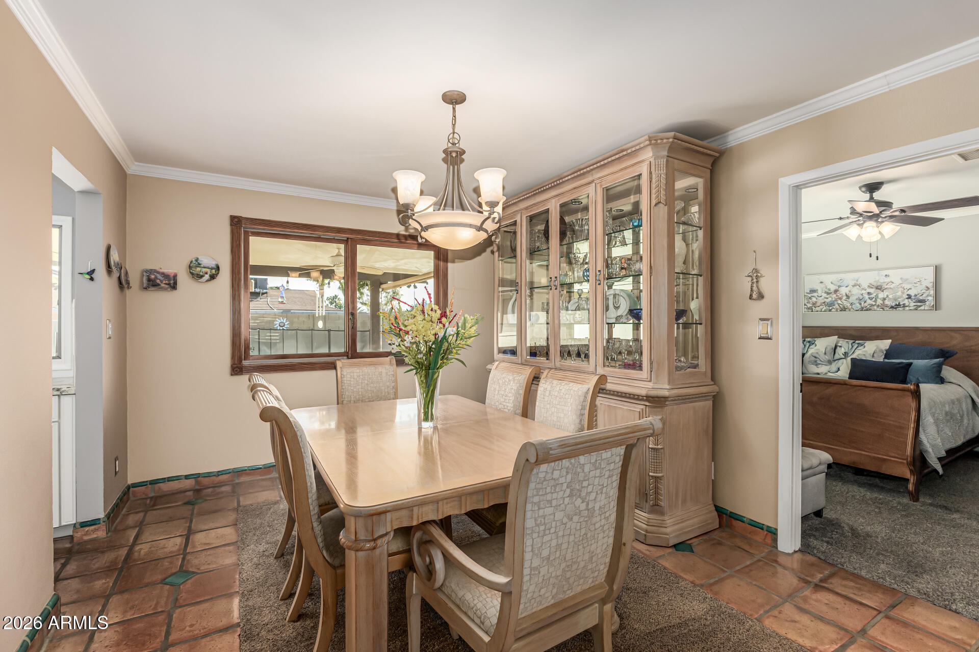 1003 East Watson Drive Tempe, AZ 85283 - Photo 7 of 39 a view of a dining room with furniture and a chandelier