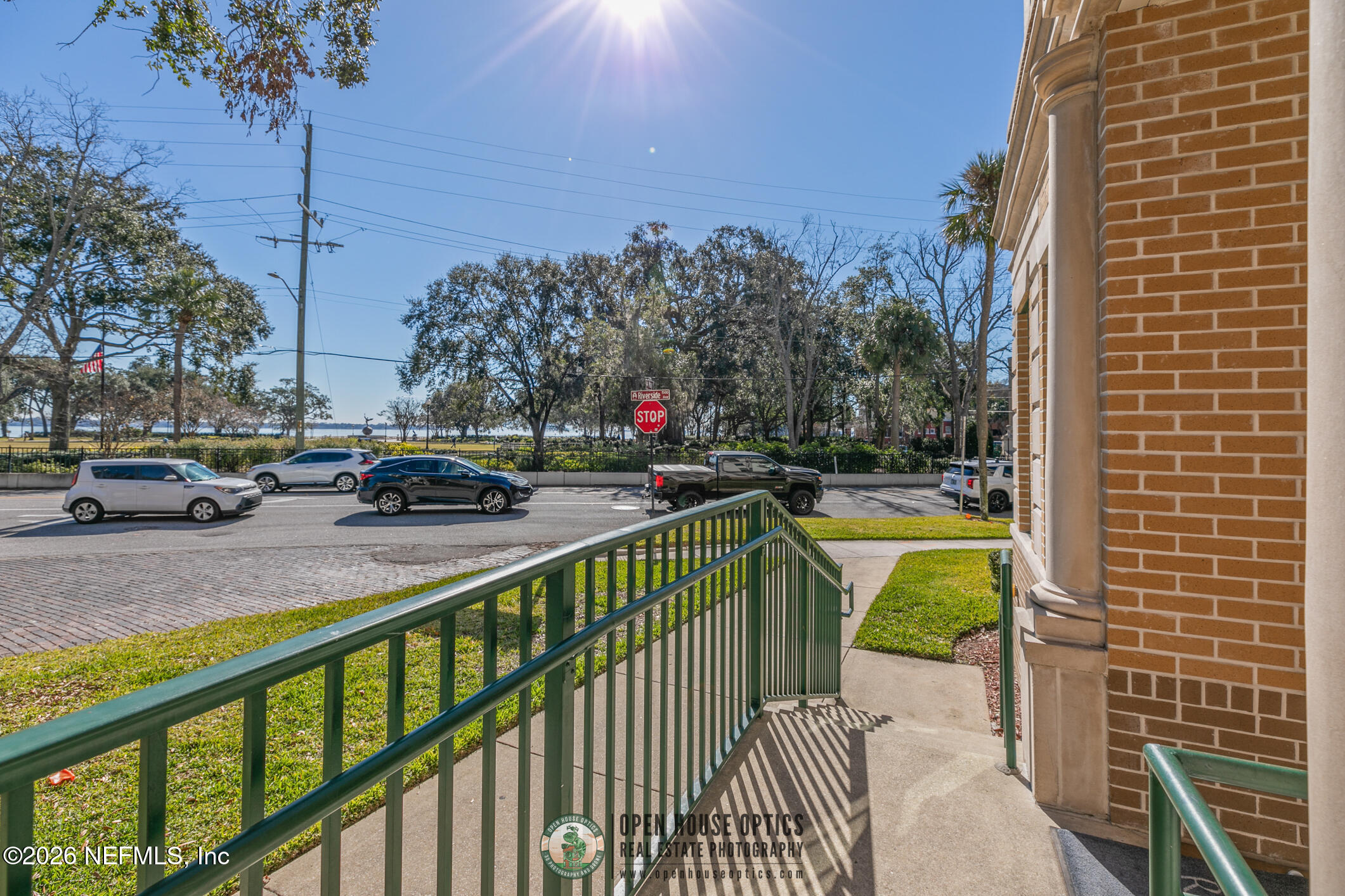 1661 Riverside Avenue, Unit 407 Jacksonville, FL 32204 - Photo 30 of 60 a view of building with swimming pool and seating