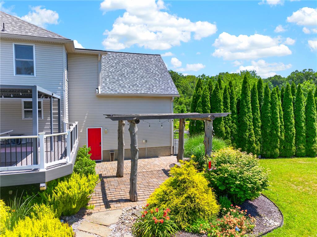 220 Pennbrook Road Stroudsburg, PA 18360 - Photo 52 of 60 A private outdoor patio with pergola and raised deck creates an ideal space for entertaining.