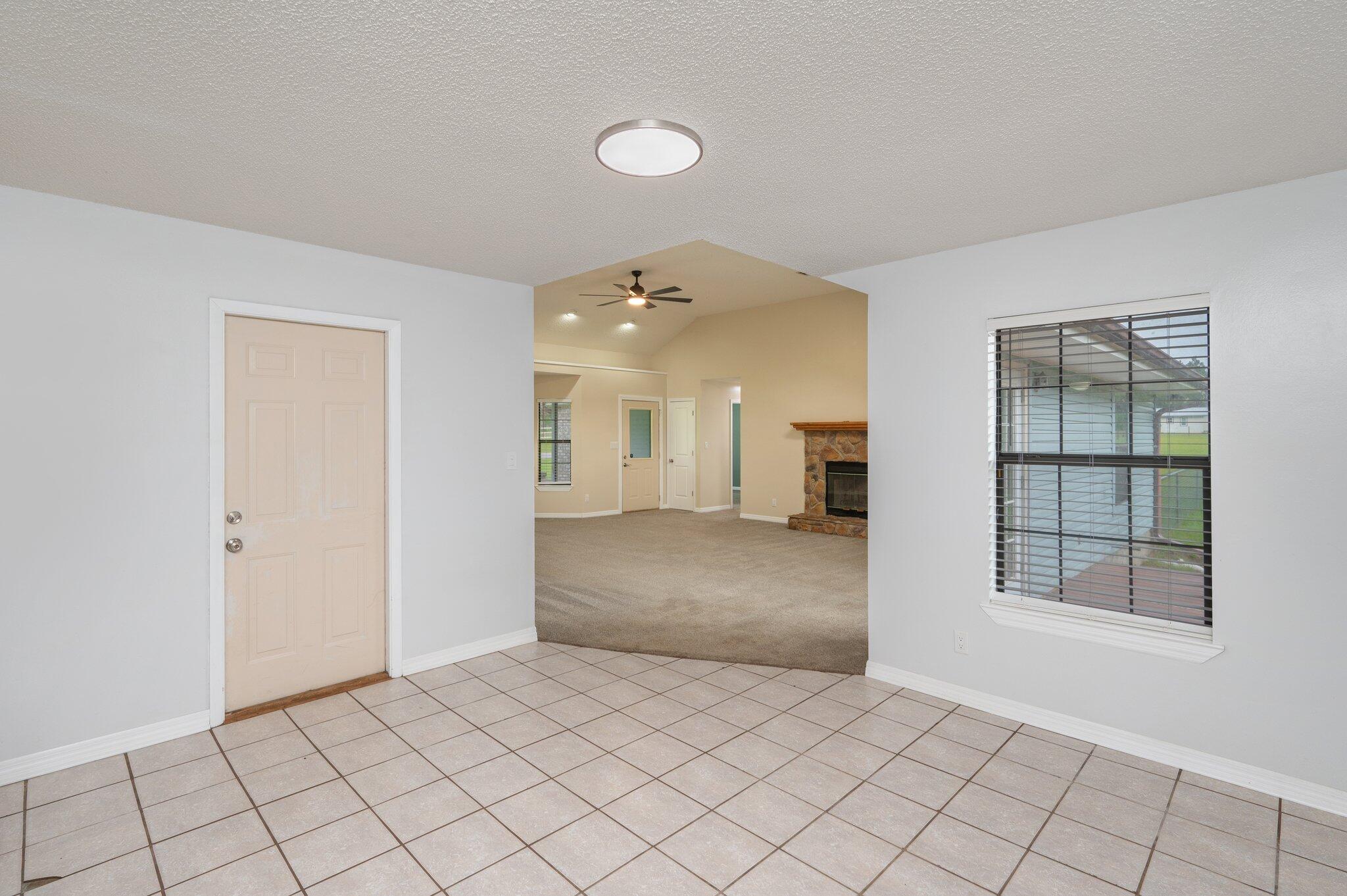 5903 Jack Stokes Road Baker, FL 32531 - Photo 10 of 35 a view of an empty room and window