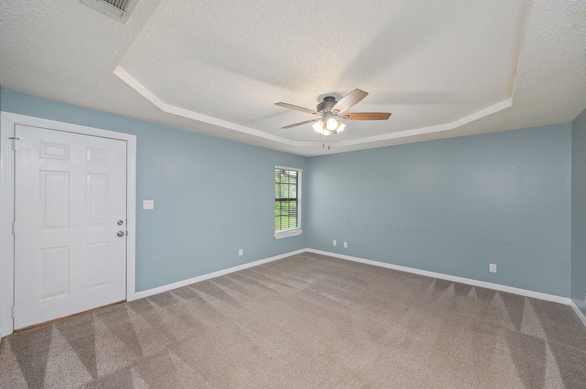5903 Jack Stokes Road Baker, FL 32531 - Photo 16 of 35 a view of an empty room with windows