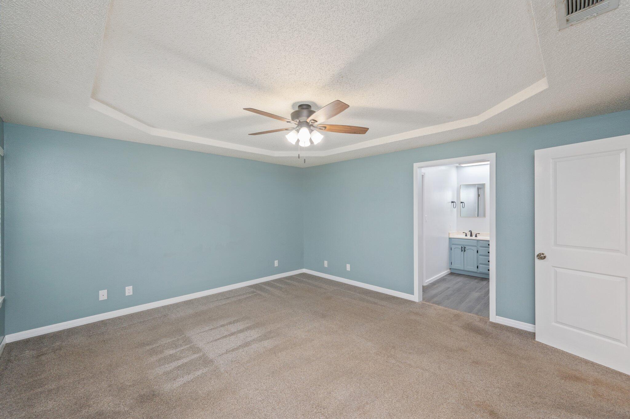 5903 Jack Stokes Road Baker, FL 32531 - Photo 17 of 35 an empty room with closet and a ceiling fan