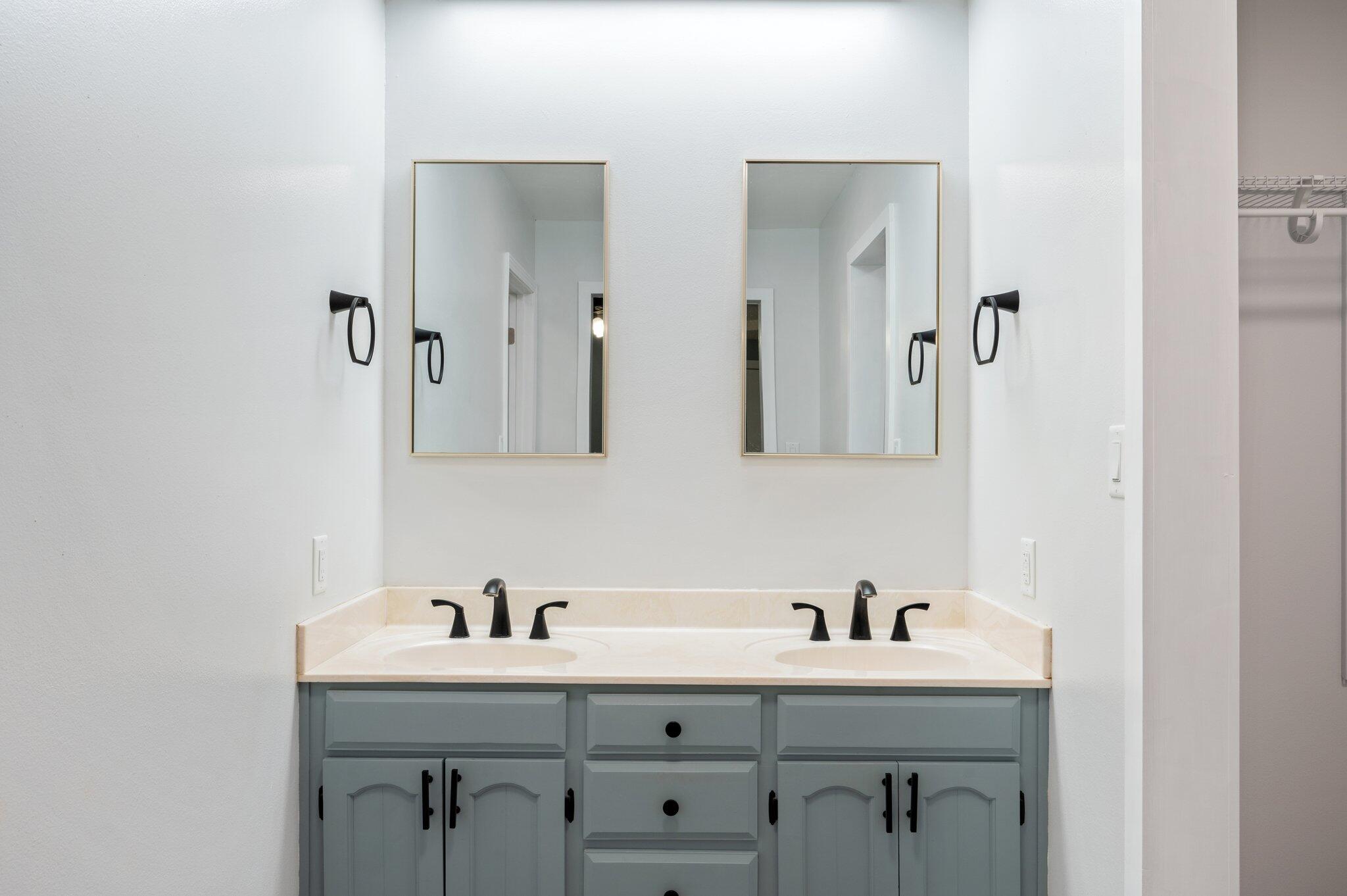 5903 Jack Stokes Road Baker, FL 32531 - Photo 19 of 35 a bathroom with a sink and a mirror