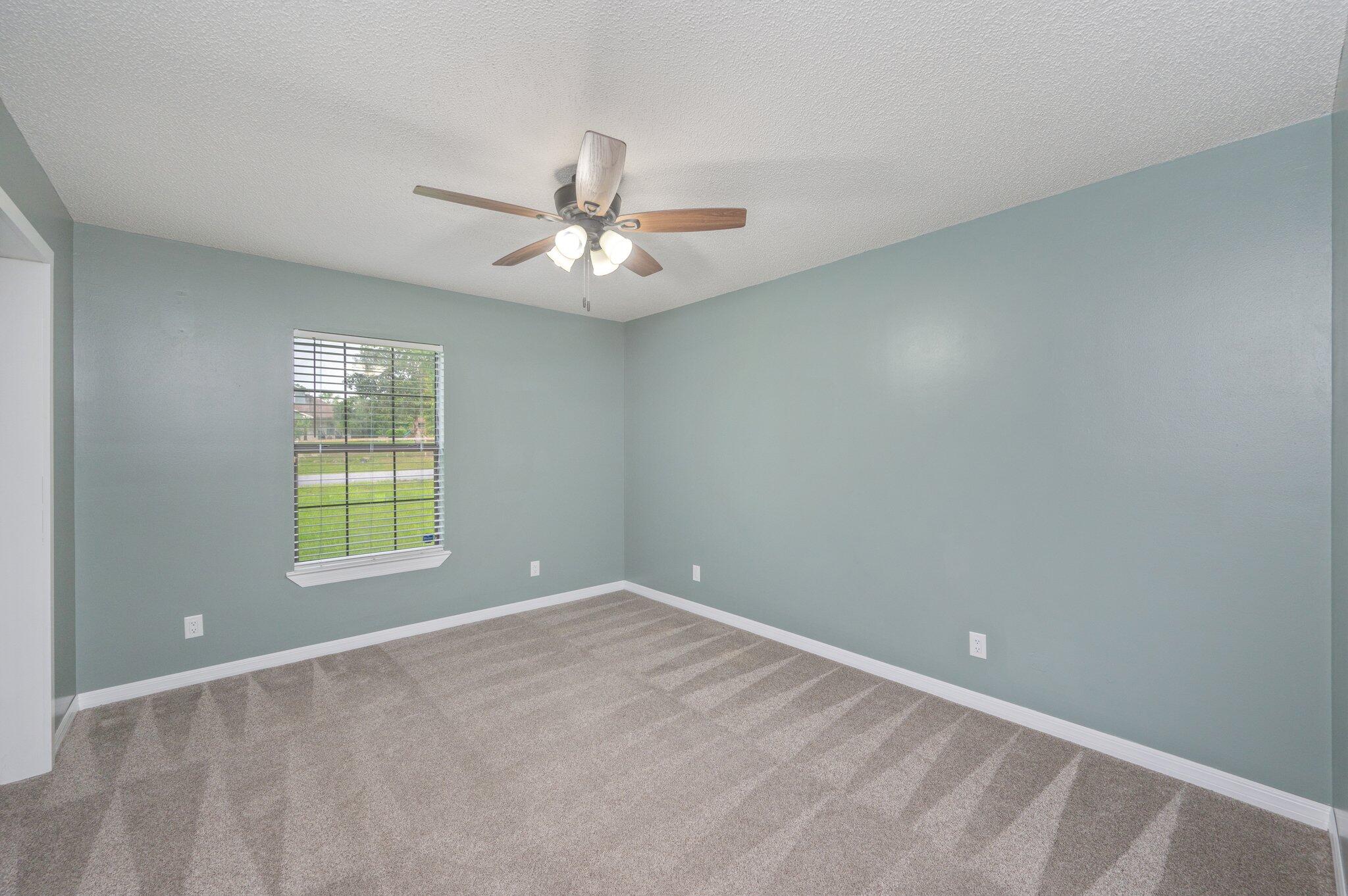 5903 Jack Stokes Road Baker, FL 32531 - Photo 23 of 35 a view of an empty room with a window