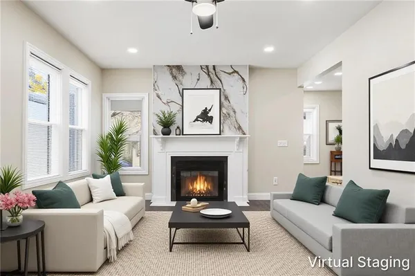 wooden floor in an empty room with a ceiling fan