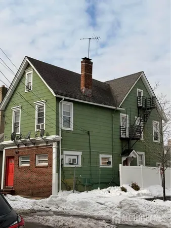 a front view of a house with a porch