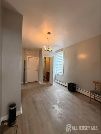 wooden floor and window in a room