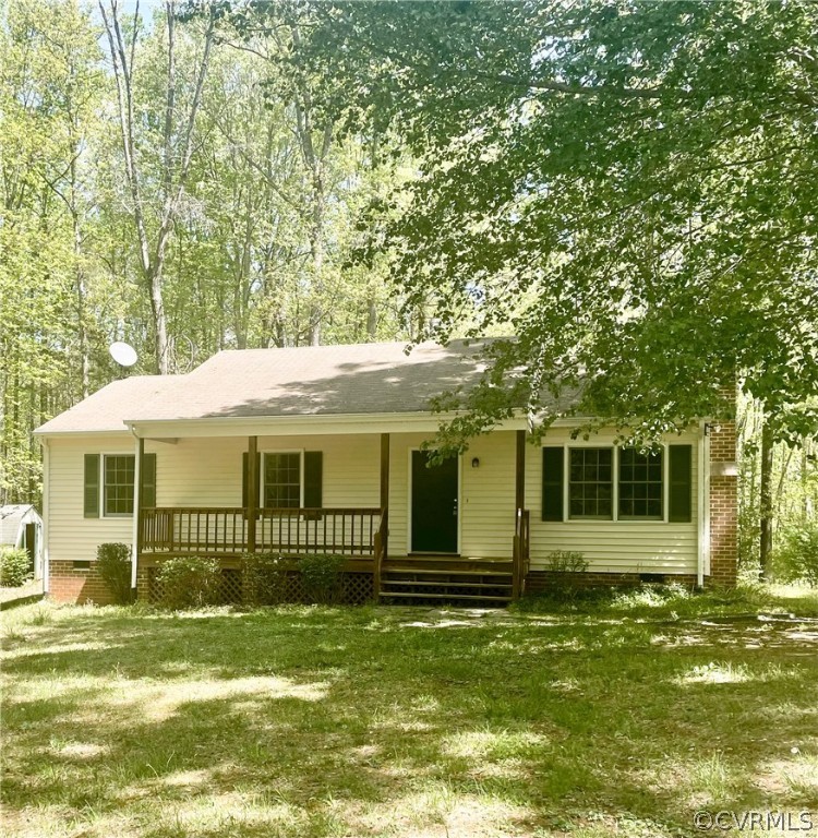 291 Proffits Road Louisa, VA 23093 - Photo 1 of 1 a front view of a house with a garden