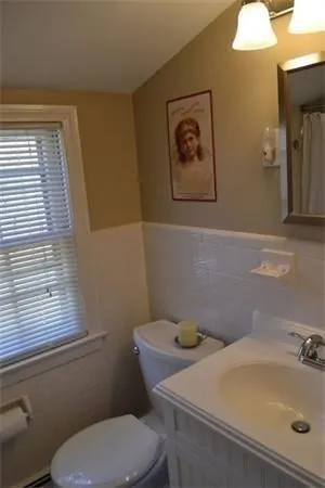 a bathroom with a sink and a toilet